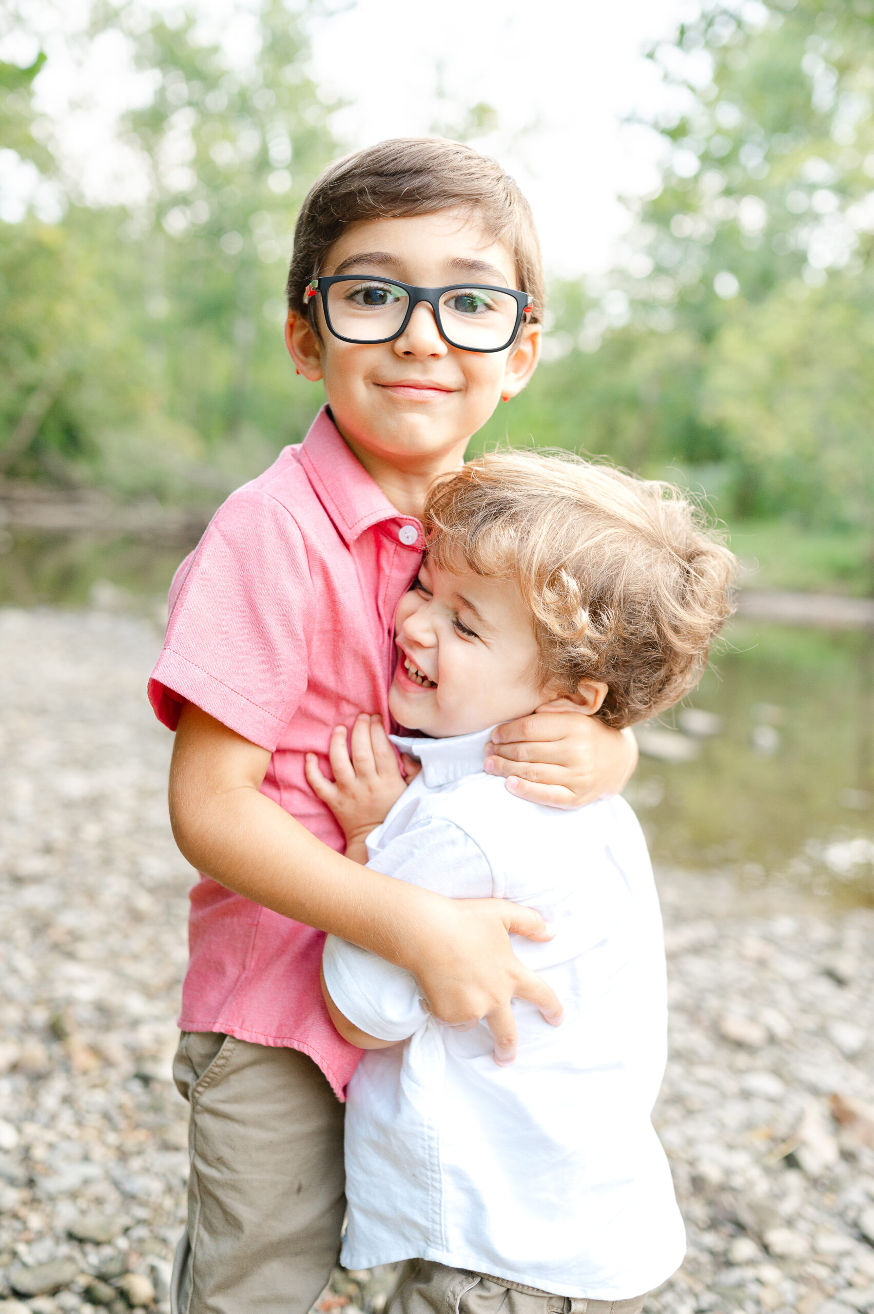 Brothers hugging during family portrait session in Dublin, Ohio